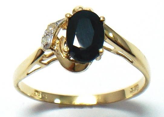 Beautiful solid 9kt gold and genuine sapphire and diamond ring.
