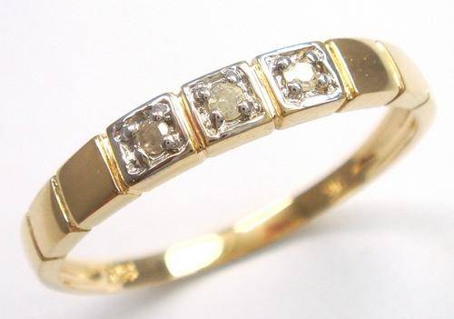 Beautiful solid 9kt gold genuine diamond ring.