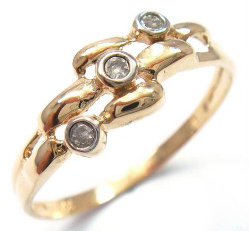 Timeless solid 9kt gold and genuine diamond ring.