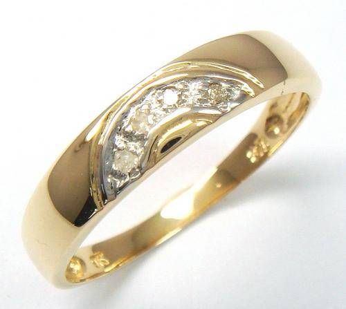 Timeless solid 9kt gold and genuine diamond ring.
