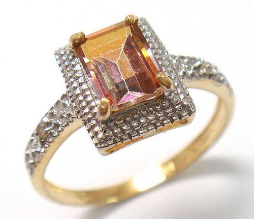 Beautiful solid 10kt gold and genuine yellow mystic topaz and diamond ring.