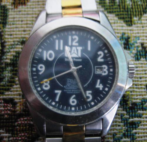 "CAT" DIESEL POWER MEN'S WRIST WATCH IN STAINLESS STEEL WITH STAINLESS STEEL WRISTBAND.