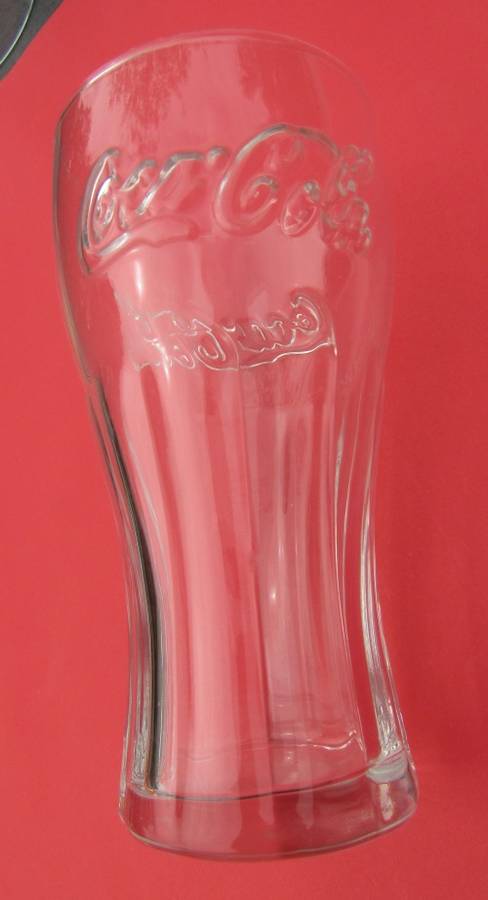 LARGE "COCA-COLA" DRINKING GLASS WITH THE NAME "COCA-COLA" EMBOSSED ROUND THE TOP.