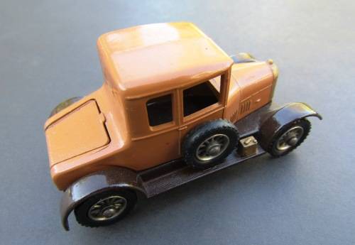 MINT DIE-CAST METAL OXFORD BULLNOSE IN BROWN BY `LESNEY MATCHBOX` FROM ENGLAND. NOT DINKY TOY.