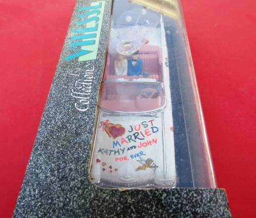 MINT BOXED 1959 CADILLAC `WEDDING CAR` WITH BRIDE AND GROOM AND DRIVER BY VITESSE. NOT DINKY.