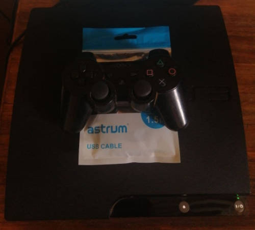 PS3 (HEN) INCLUDING 15 GAMES GTA V,UNCHARTED 2,FIFA19 and WWE 2K15 TO NAME A FEW.