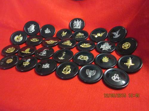 Rhodesia: Full set Rhod. Military Badge coasters. (27 in number)