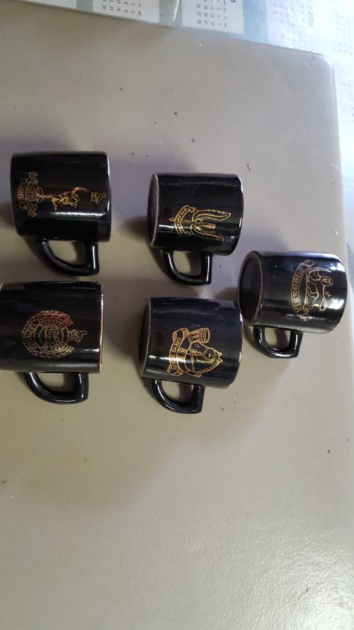 RHODESIA; SET OF FIVE MINATURE COFFEE MUGS WITH MILITARY BADGES