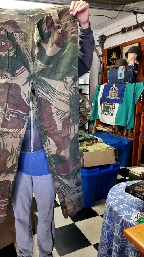 RHODESIA, CAMO TROUSERS IN GOOD CONDITION SIZE 36. LENGTH 700