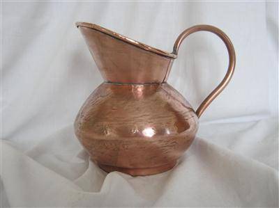SMALL COPPER JUG by DE KLERK ...17.50cm HIGH X 49.50cm AROUND THE GIRTH...