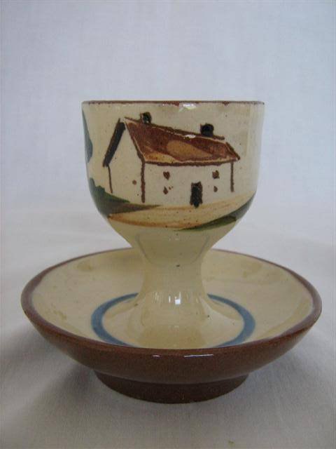 MOTTO WARE EGG CUP..8cm HIGH X 8.50cm ACROSS THE BASE...