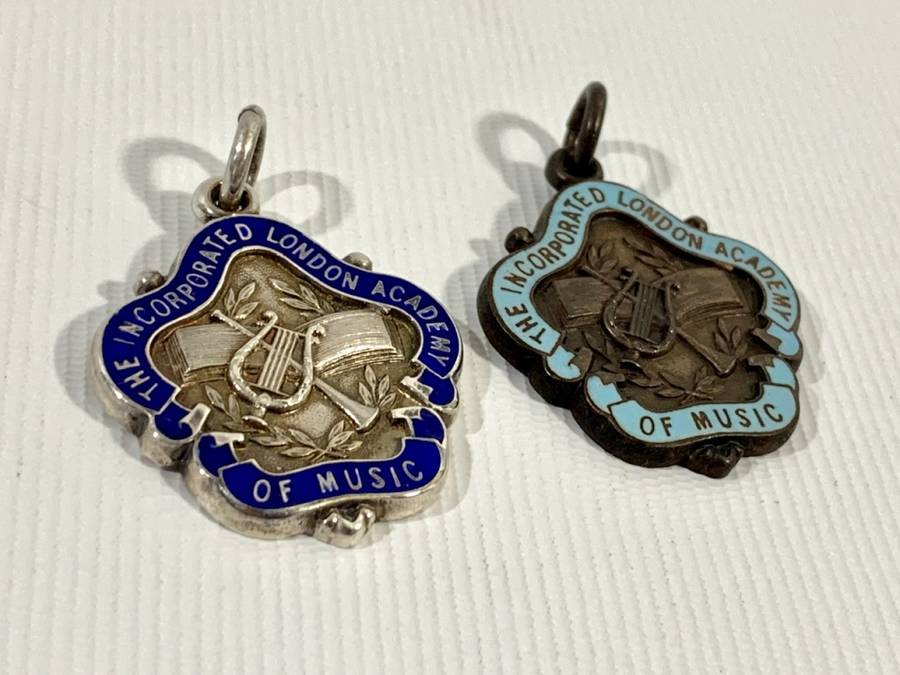 1 x Sterling Silver (13g) and 1 x Bronze Medallion
