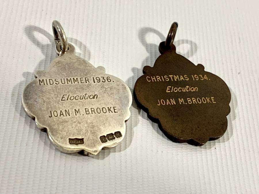 1 x Sterling Silver (13g) and 1 x Bronze Medallion