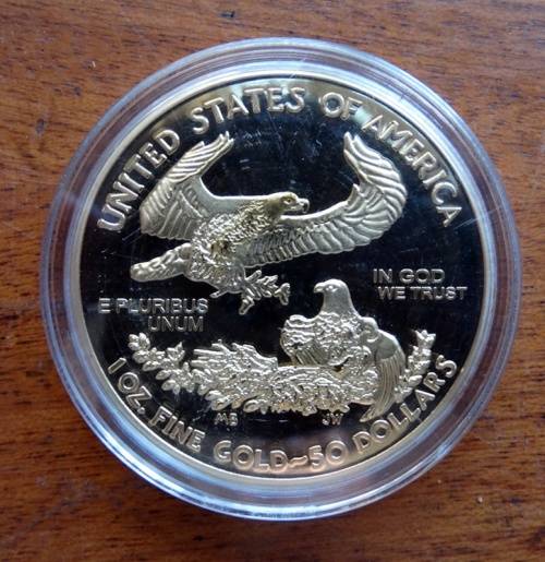 2011 United States of America 1 Ounce Fine Gold Token. (Not  Coin)