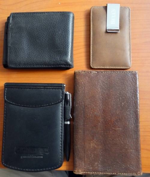 Genuine leather wallets and note pads with pen