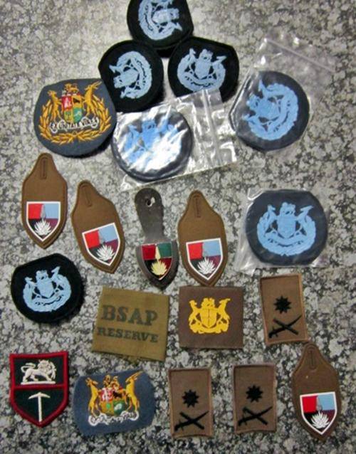 ## A Collection of Various Cloth & Embroiders Badges & Insignia ##