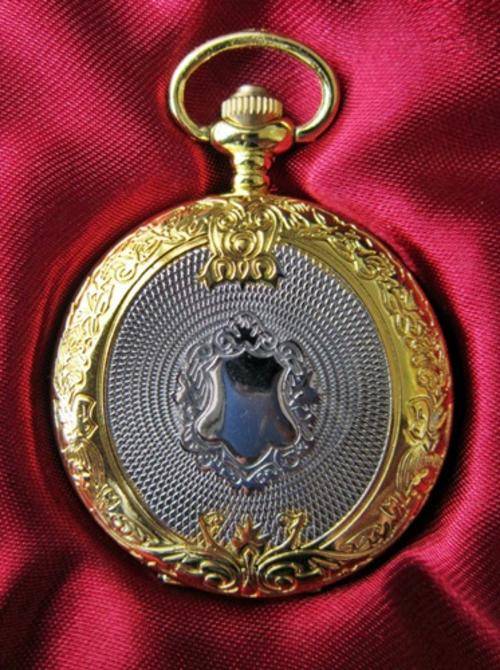 ## Modern Pocket Watch Gold Coloured Cover ** Note Needs Battery ##
