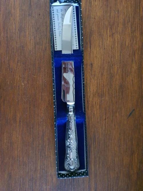 Silver handled kings pattern cake knife