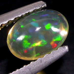 UNHEATED 0.55 ct RARE MULTI COLOUR PLAY EFFECT OPAL OVAL GEMSTONE