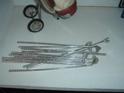 MINIATURE GOLF BAG AND CLUBS.