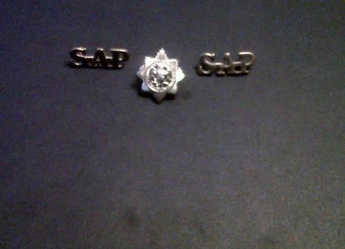 SA Police collar badge and shoulder titles