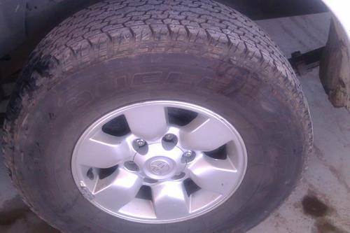 Toyota D4Dhilux 6 stud raised body, 15 inch. good tyres