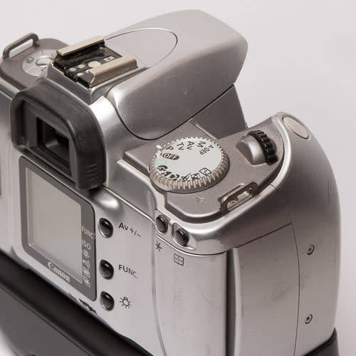 Canon EOS 300V with BP-220 and lens