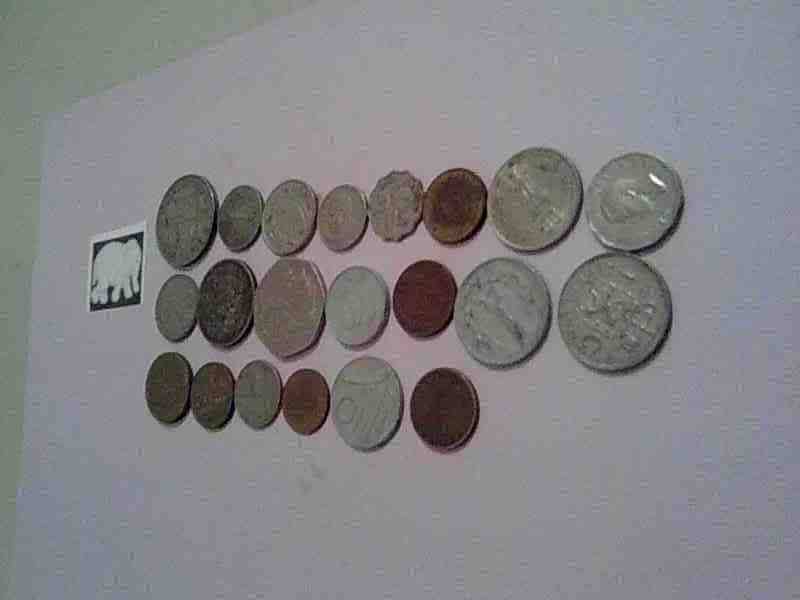 21 DIFFERENT COINS FROM AROUND THE WORLD