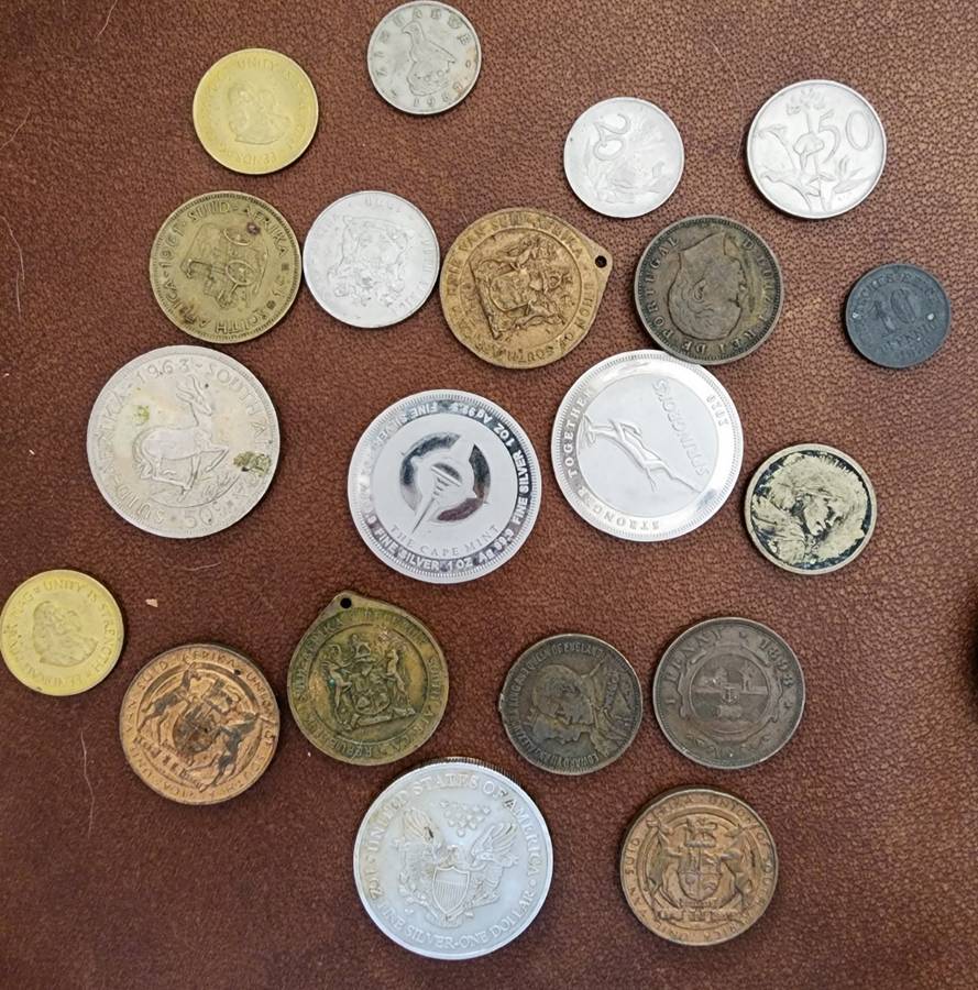 Old tin box full of watches  pocket watches, coins and pins