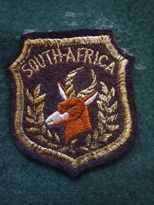 SPRINBOK BADGE 1950s-INTERNATIONAL SCROLL- WITH 29X EMBROIDERED BADGES