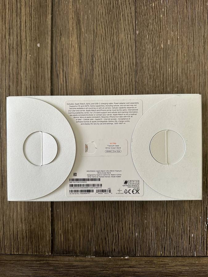 Apple Watch Ultra GPS + Cellular, 49mm Titanium Case with White Ocean Band