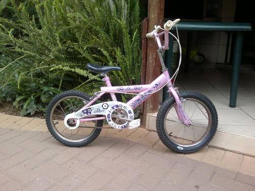 Girls Bicycle (size 16) with new tyres and tubes just fitted with extra training wheels