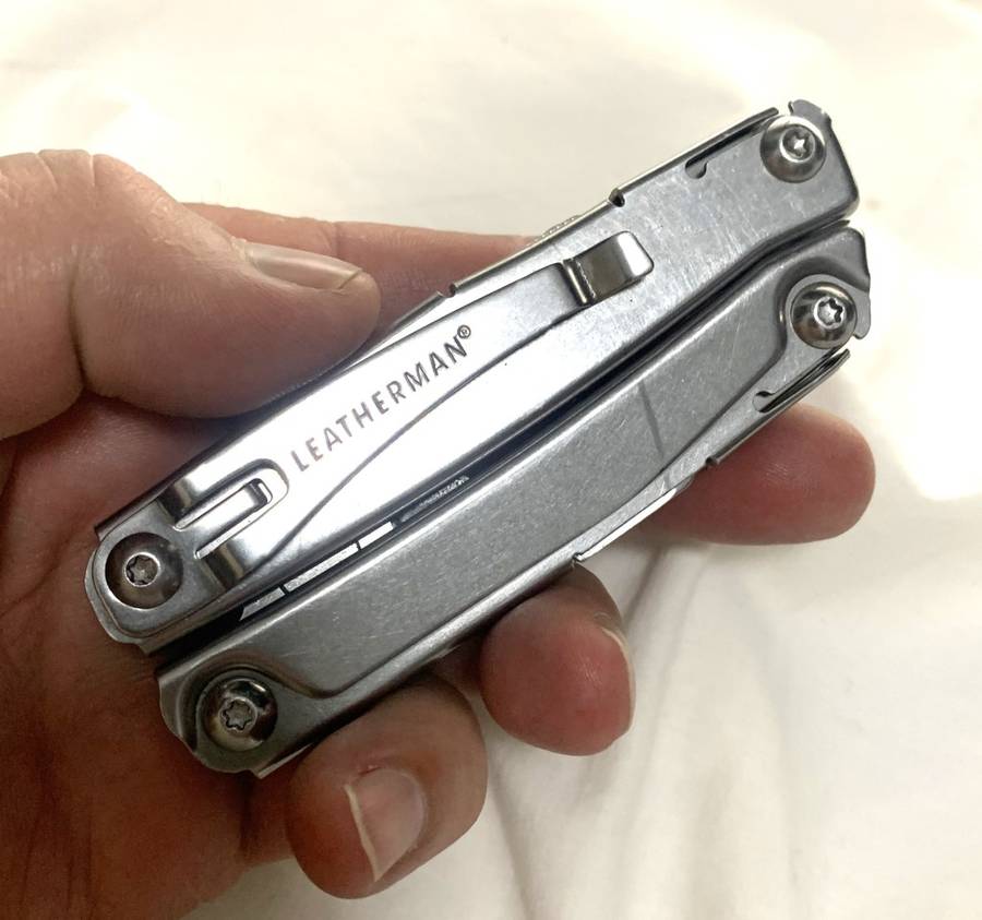 Leatherman REV Multitool knife plus generic pouch.