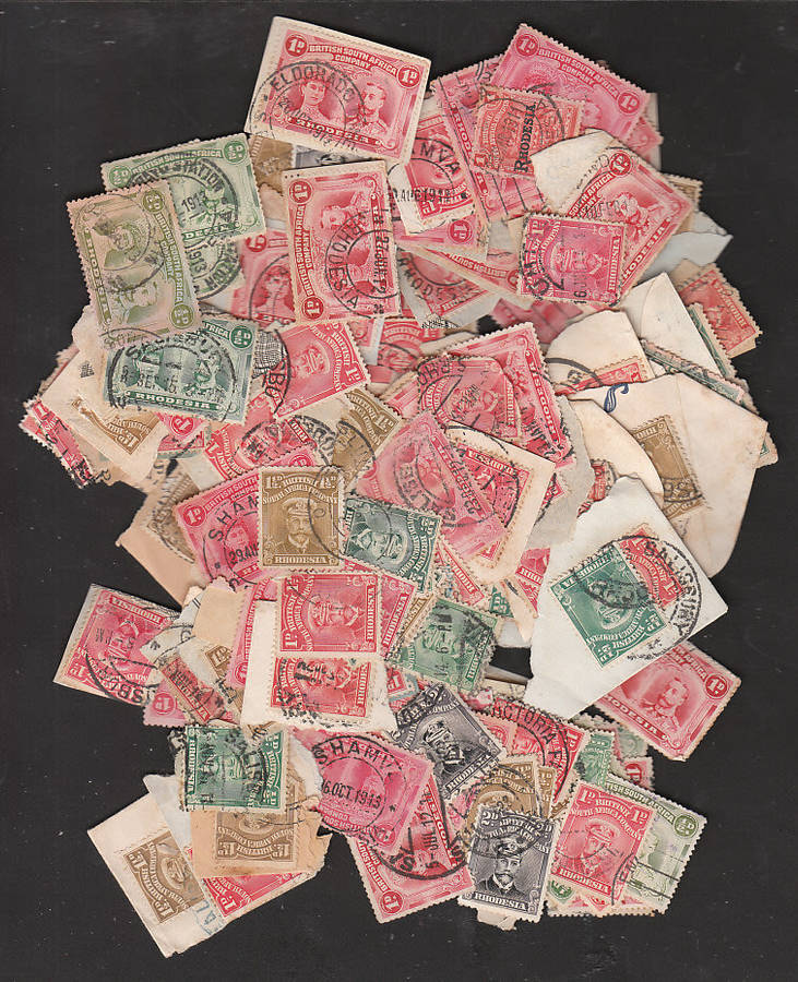 RHODESIA 1910-1913 USED ACCUMULATION OF ABOUT 130 LOWER VALUES DOUBLE HEADS AND ADMIRALS AS PER SCAN