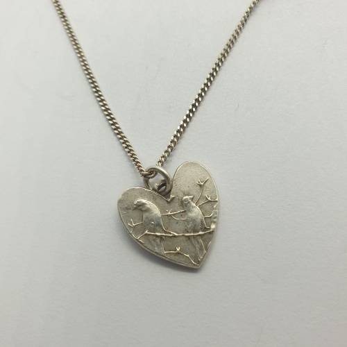 Sterling Silver chain with a stunning heart 1 Cent heart Pendant | 3.6g total weight.