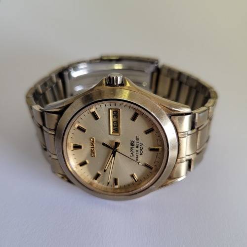 Seiko Sapphire Crystal Gold Tone Men`s Watch | Stainless Steel | 100m Water Resistant