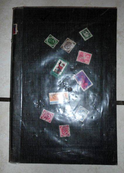 OLD STAMP ALBUM WITH STAMPS