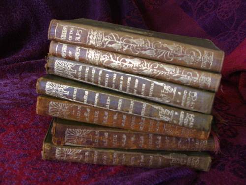 LOT OF 7 VINTAGE DECORATIVE BOOKS