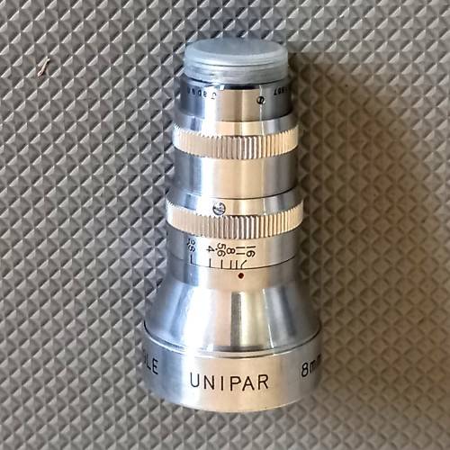 Unipar 8mm F2.8 Movie Wide Angle Movie Camera Lens with Front and Rear Caps. Working condition