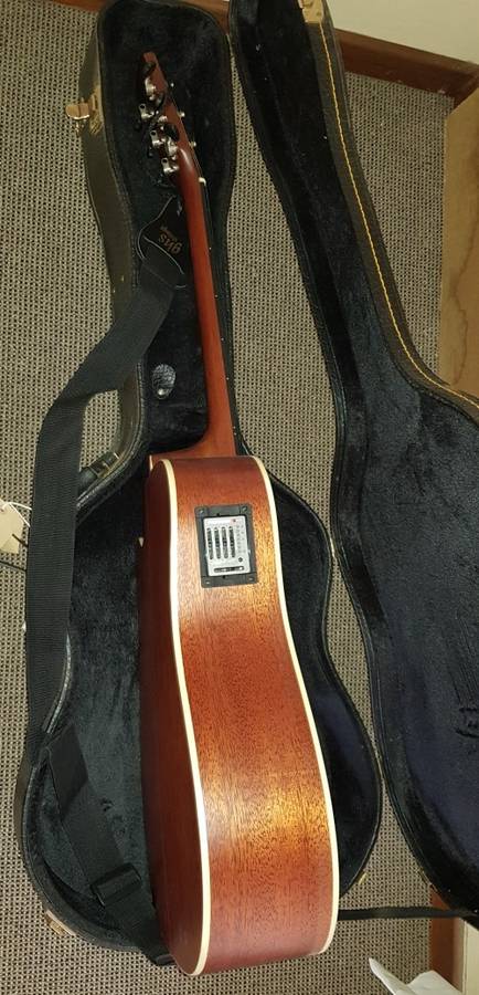Cort Acoustic steel string Guitar with tuner/pickup and hard carry case