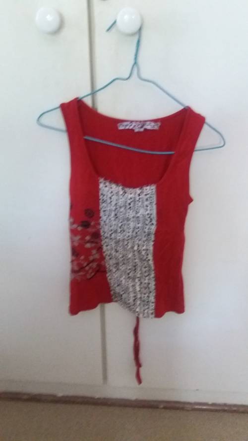 Ladies red top with bird print in side. Size small brand Rage closet clearance