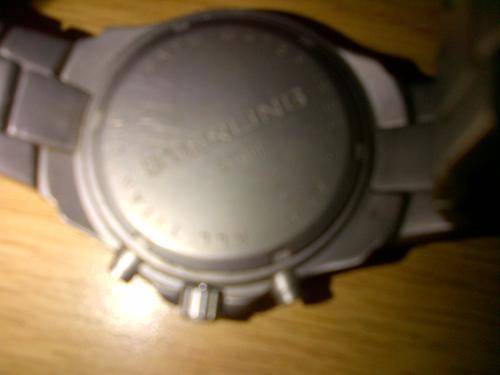 the watch and strap is made out of titanuim, with silver stripes