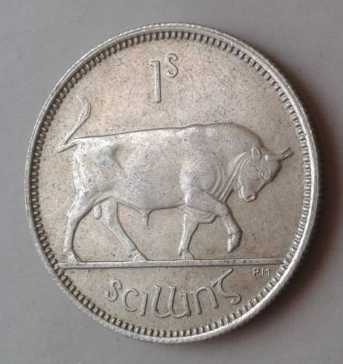 Top grade 1942 Ireland silver shilling in AU
