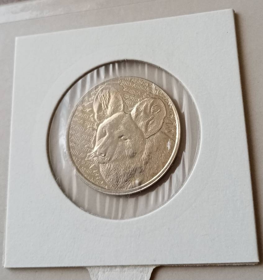 2012 Coin World token (Spotted Hyena)
