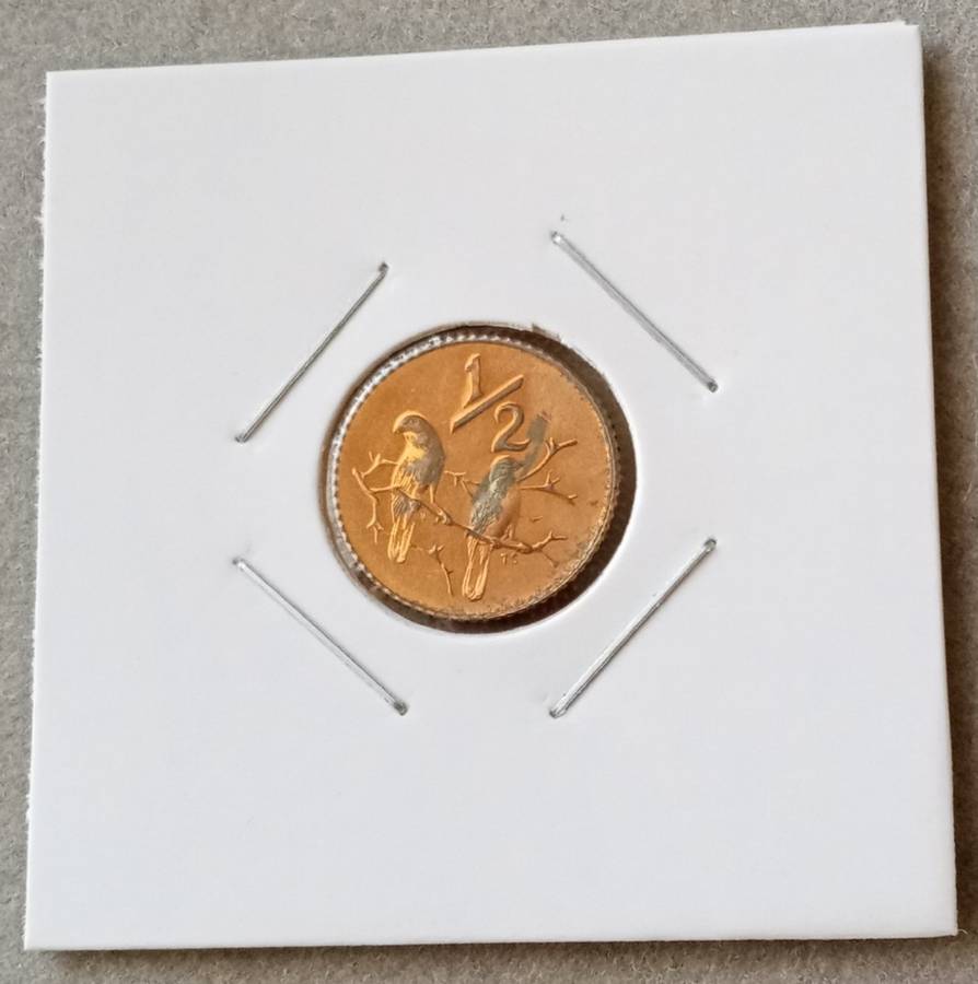 Scarcer 1980 proof 1/2c (mintage: 15000)