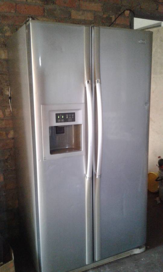 LG double door fridge with ice maker, crusher and water dispenser