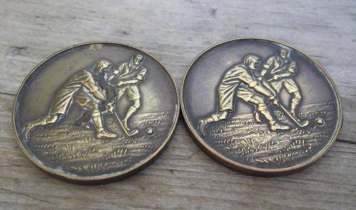Pair of Hockey medals awarded to S Paul - Queen's Battery 1953