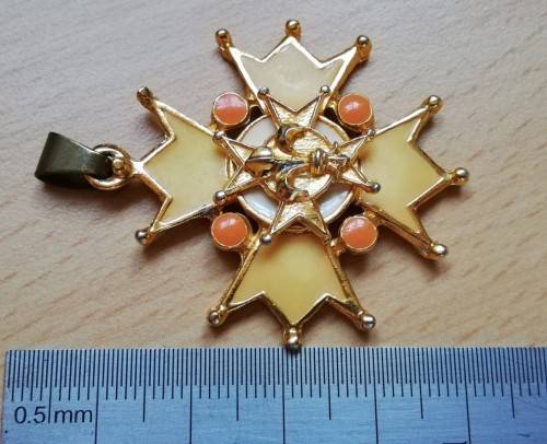 Vintage pendant with little orange stones