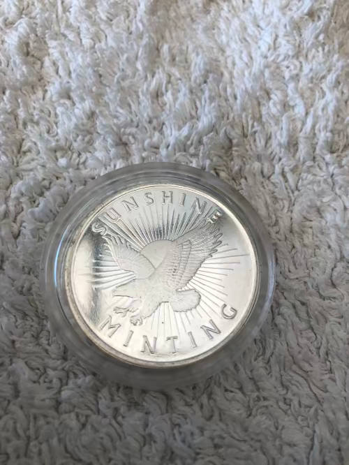1 oz silver mint coin 99999 silver (Low Start price)