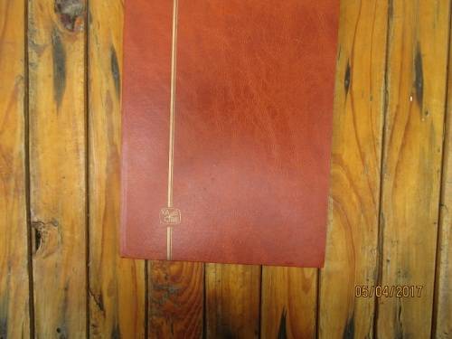 A4 KABE BROWN STOCK BOOK MIXED WORLD REQUIRES SORTING. BOOK HAS FOXING